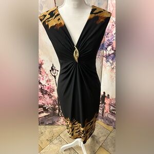 Cache - Elegant Black with Animal Print & Gold Broch Detail. Size 6.